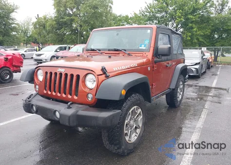 2014 Jeep Wrangler Rubicon z USA, uszkodzony, nr VIN 1C4BJWCGXEL291212